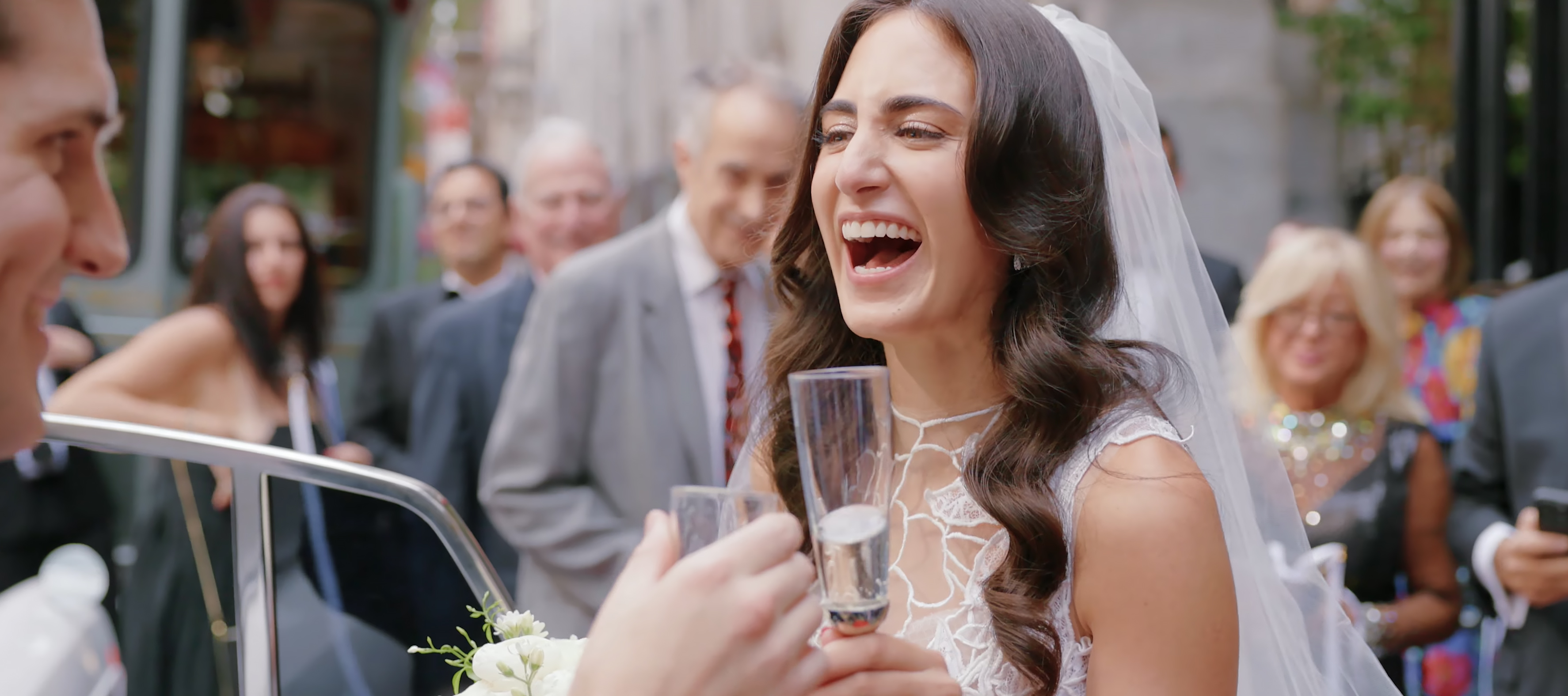Allison laughing during a champagne toast in New York City