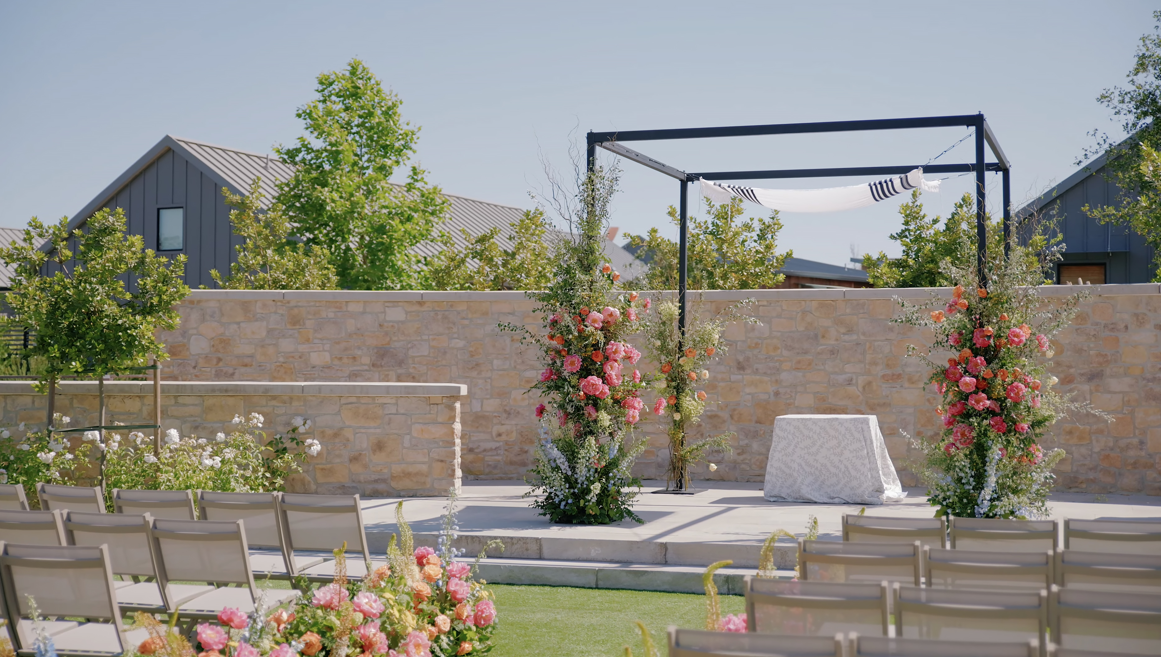 Outdoor ceremony space at Stanly Ranch with colorful florals
